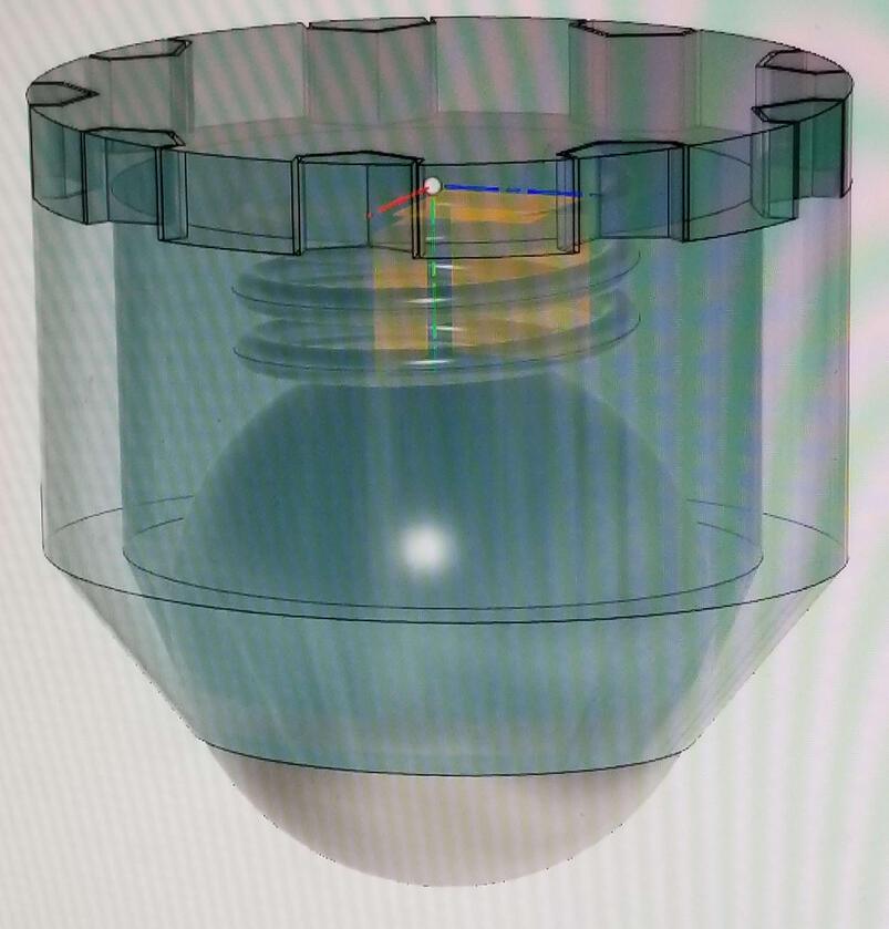 A photo of a computer screen with a CAD model of the high school robotics team "AEMBOT" 's icon and logo. The icon sits atop a short pedestal with the team name (in logo format) extruded. The entire design rests on a dark blue plate.